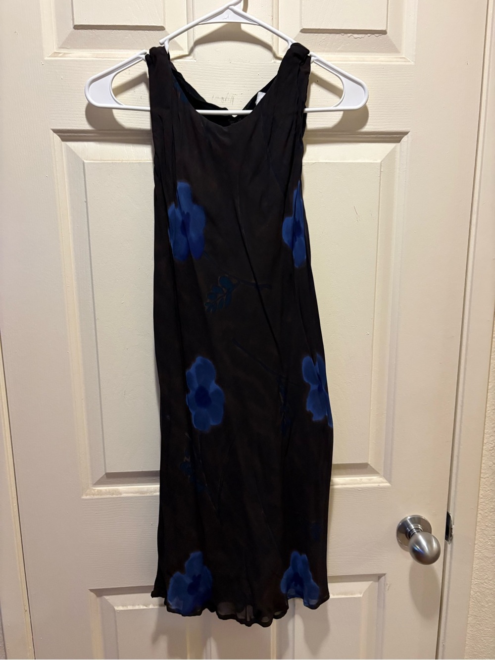 Sleeveless Black Midi Dress with Blue Floral Print